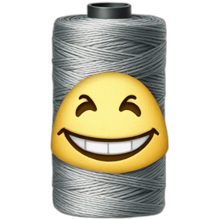 Spool of Sewing thread with a smile emoji