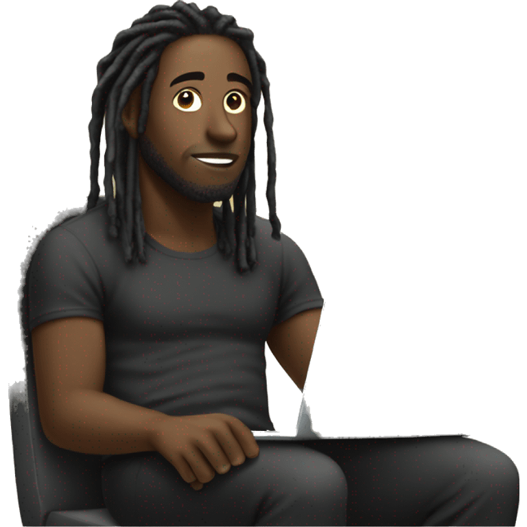 Black-guy-with-dreads-wearing-black-trackstuit-sitting-down-on-chair facing-foward-focused-on-laptop-computer- emoji