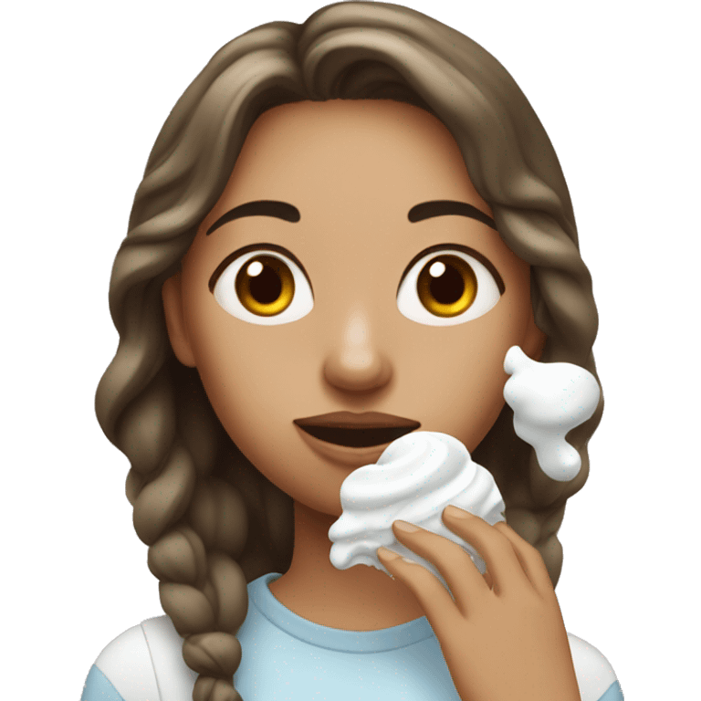 Girl getting white icing on her face emoji