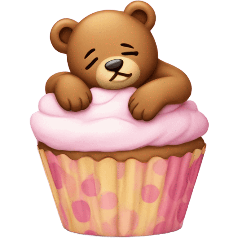 Sleeping teddy bear leaning against a cupcake emoji