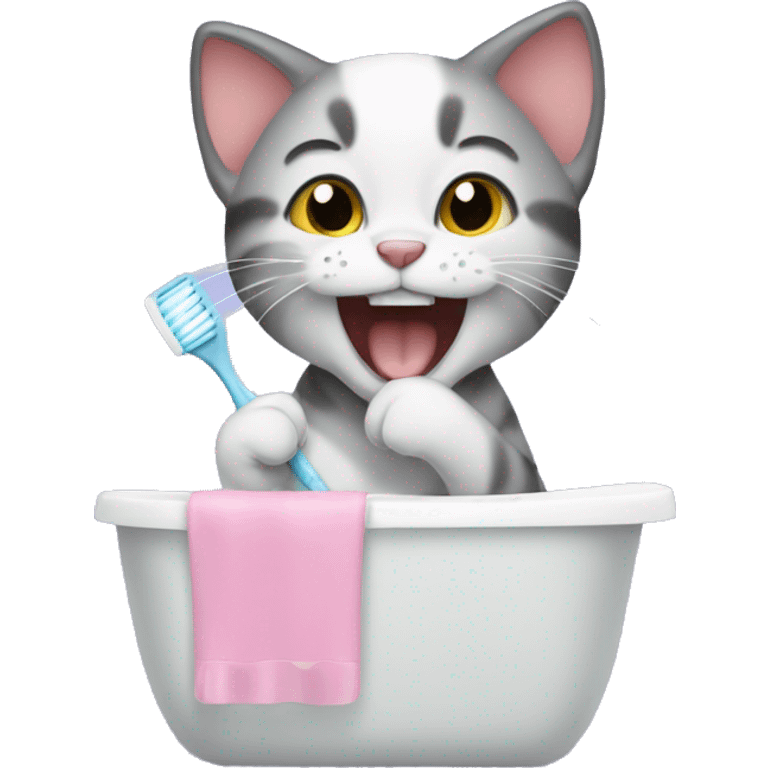 The kitten is brushing its teeth. emoji