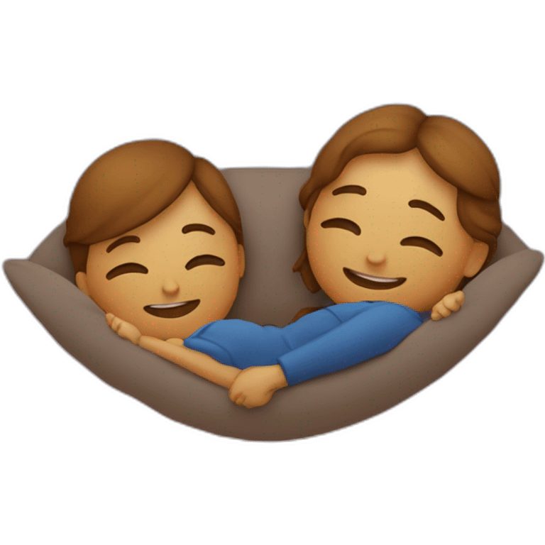 Deux personnes qui s’embrassent sur un couché de soleil emoji