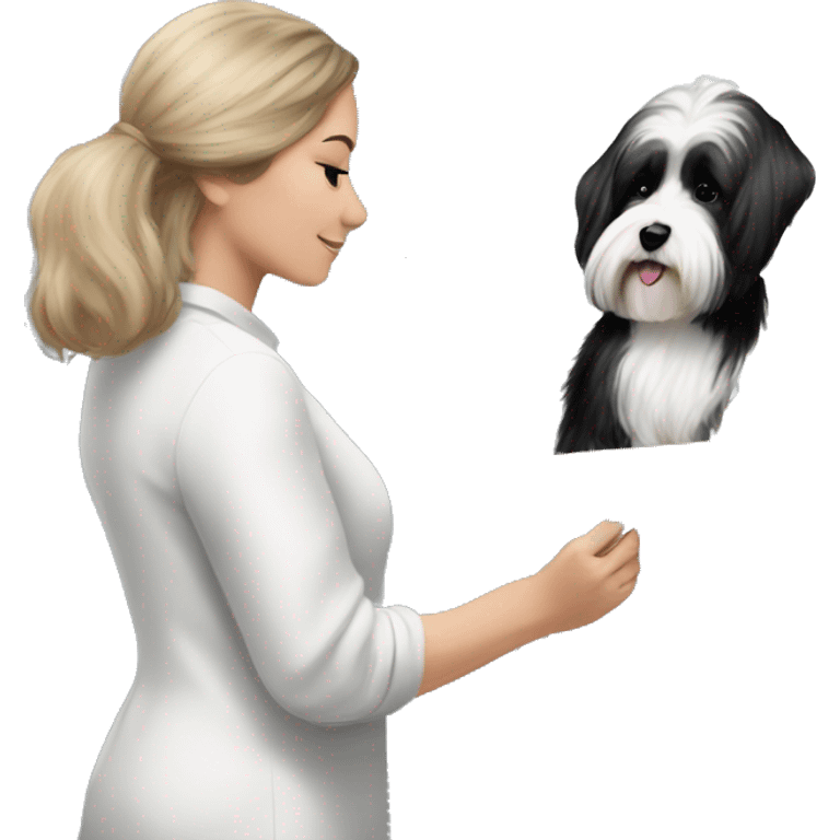 female artist painting a painting of black+white havanese on easel emoji