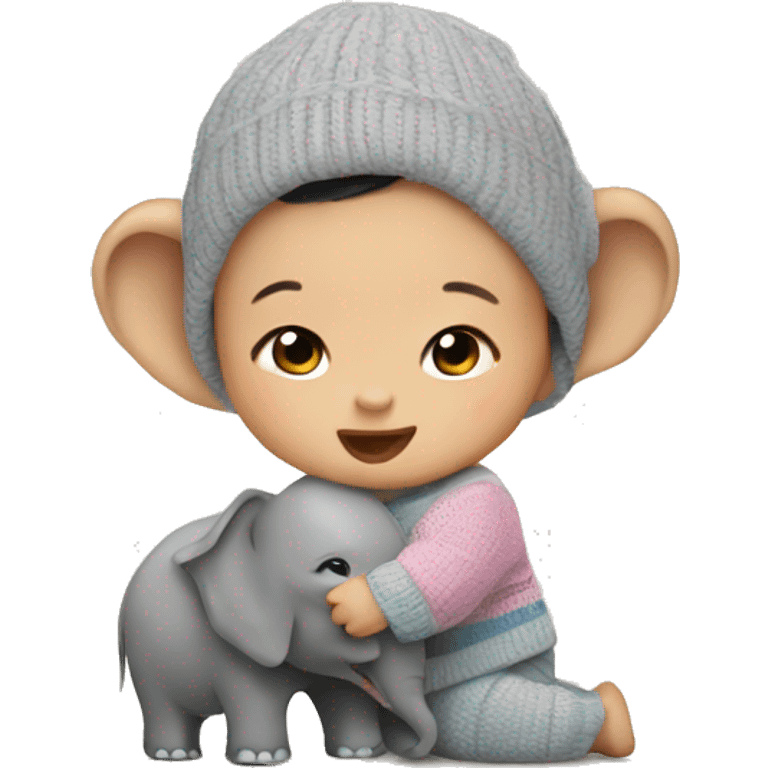 Asian baby in a sweater playing with an elephant  emoji