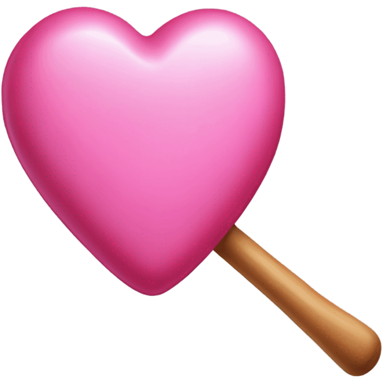 Heart candy: A round candy with a small paddle in the center emoji