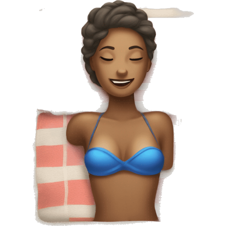 Women laying on a towel tanning at the beach emoji