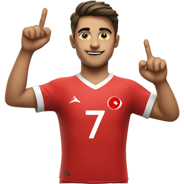 A young Turkish football player holds his jersey emblem with his right hand, points the sky with his left hand emoji