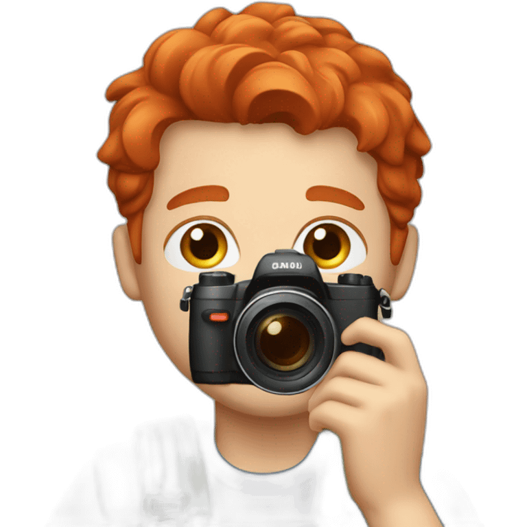 A red-haired boy vlogging with a camera emoji