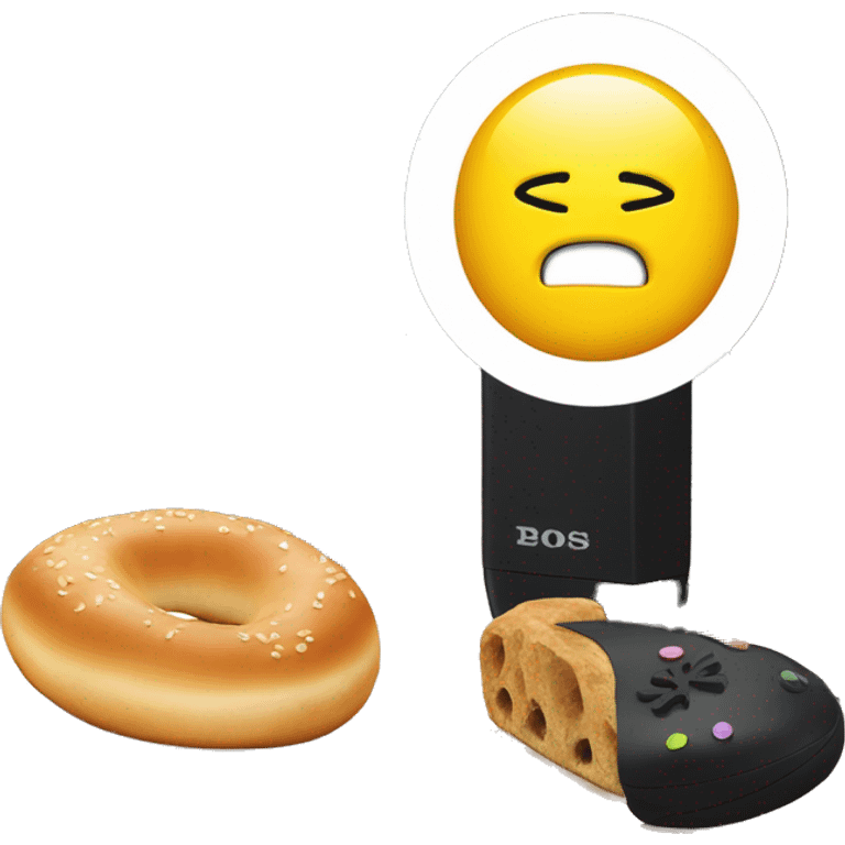 ps5 on a desk next to a bagel with lochs emoji