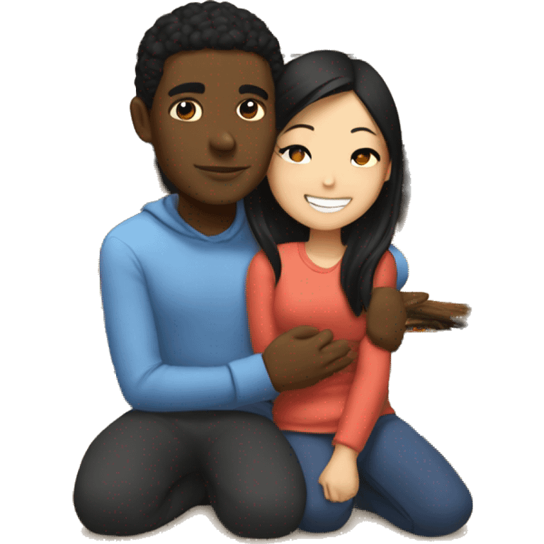 Black guy and Asian girl cuddle near by fireplace  emoji