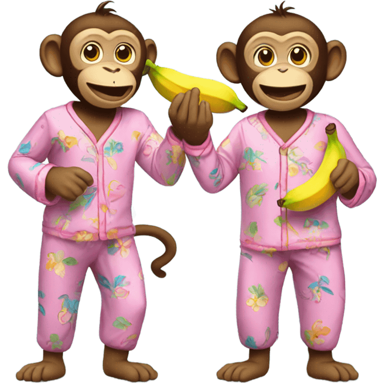 two monkeys holding a banana in pajamas emoji