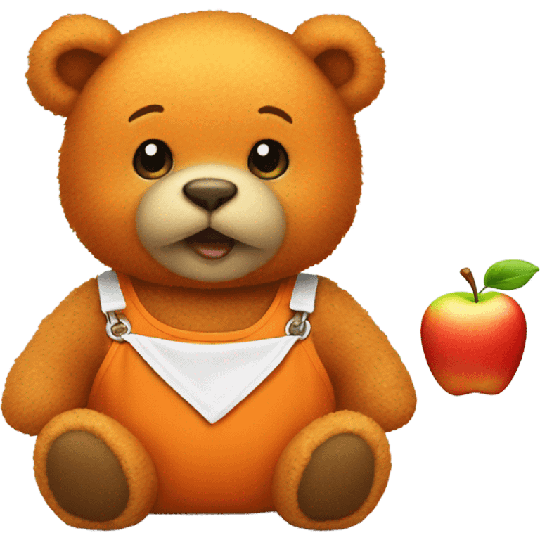 Small orange teddy bear wearing a bib with an apple on  emoji