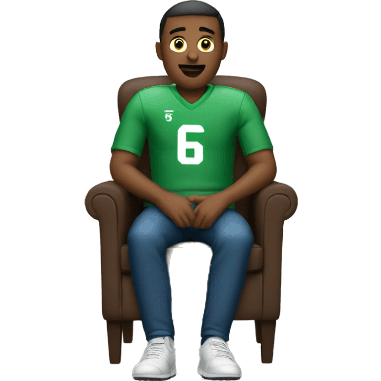 man sitting in chair watching football emoji