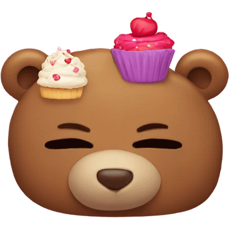 Sleeping teddy bear with cupcake on its head emoji