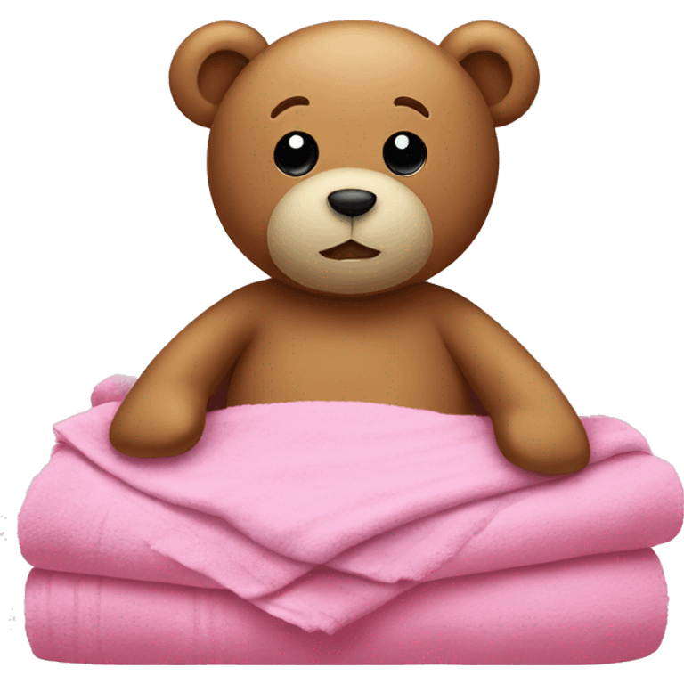 Teddy in bed with pink sheets and a towel emoji