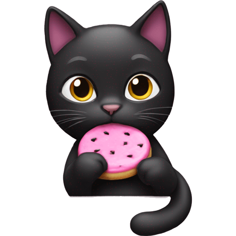 black cat eating a pink cookie emoji