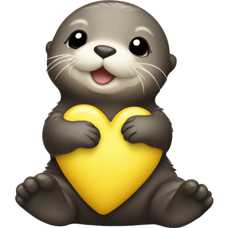 Baby sea otter with yellow heart in its paws emoji