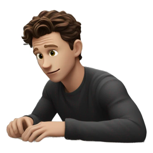 tom holland at his desk looking at his computer sticker