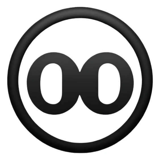 Black circle with “MB” written on in the middle of it. Nothing else no holes or anything. sticker