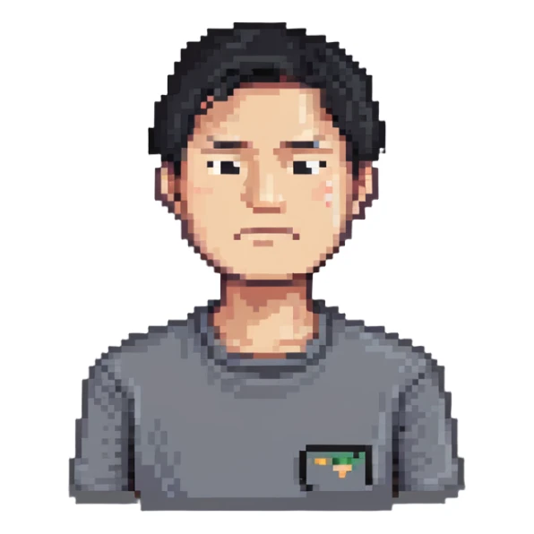 Asian man in a gray shirt with a frown sticker