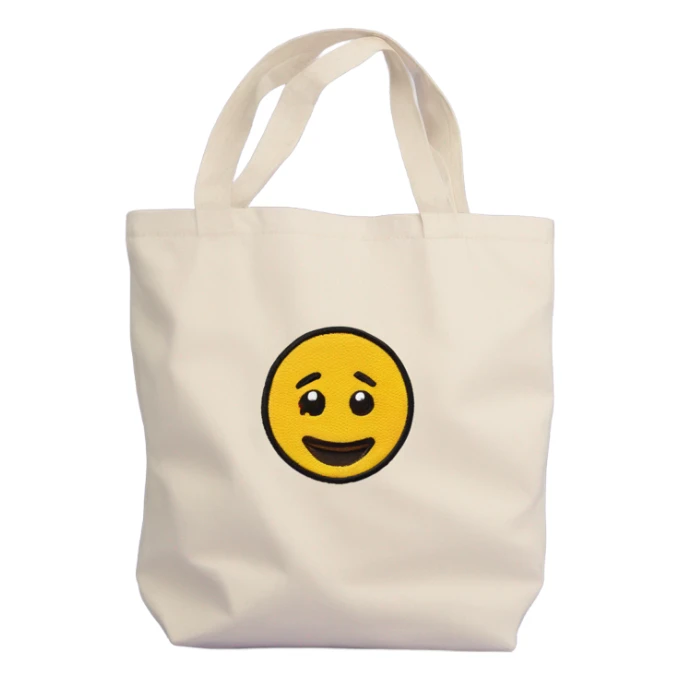 Canvas tote bag with an embroidered “S”  sticker