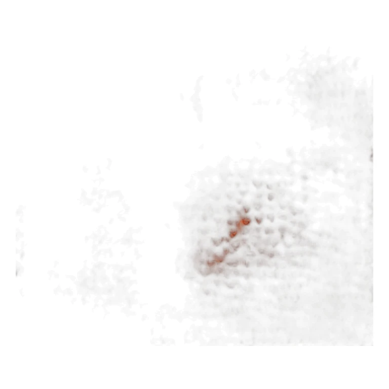 A red MacBook with the orange and black logo sticker