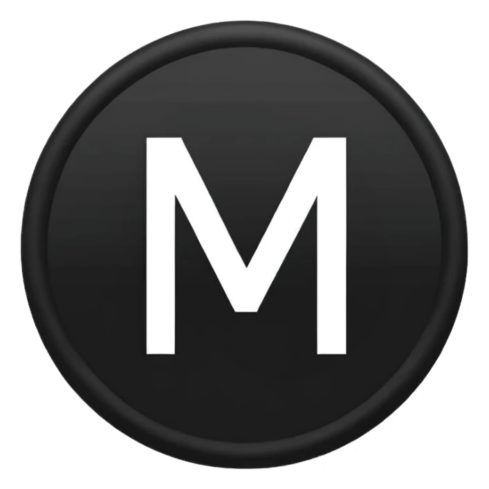 Black circle with “MB” written on in the middle of it. Nothing else no holes or anything. sticker