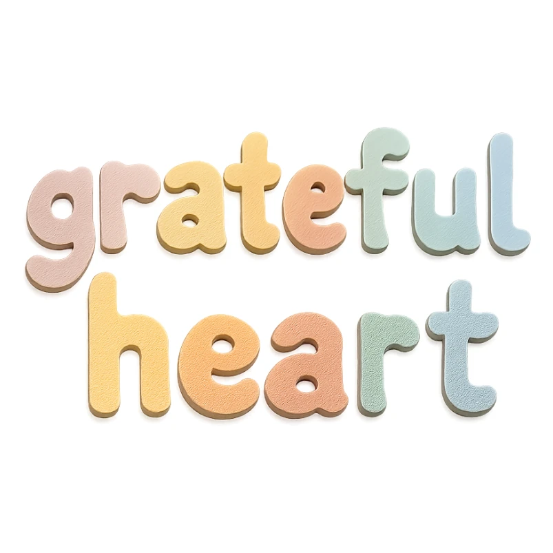 "Grateful Heart" in soft pastel rainbow soft puffy lettering, cute hand-drawn font, no outline, transparent background sticker