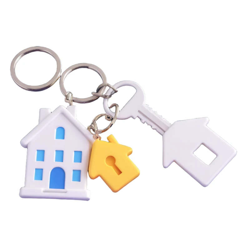 side view of a pair of white keys on a ring with a white house-shaped keychain, 3D Emoji style, soft shadows and highlights, no decoration, transparent background sticker