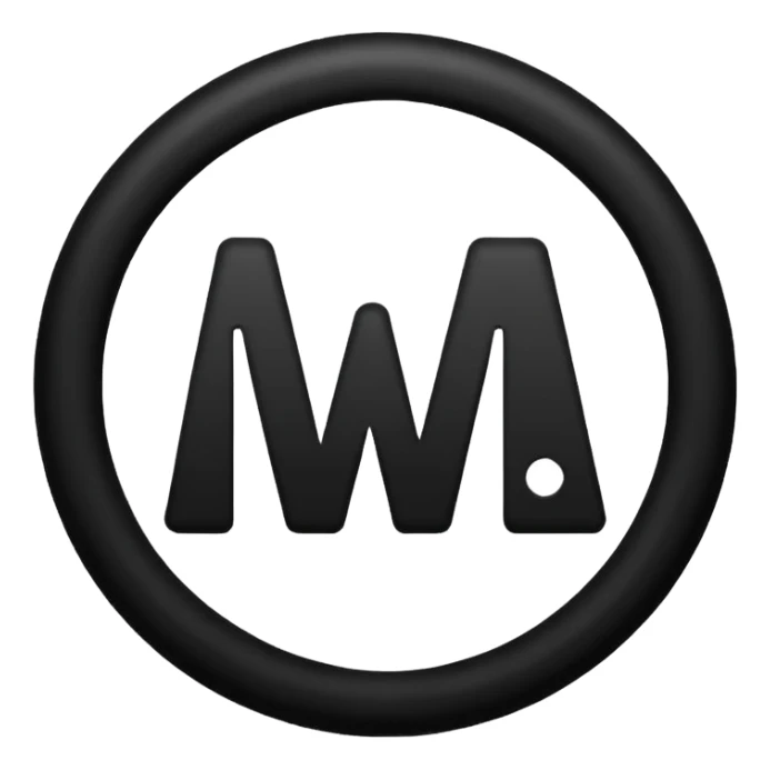 Black circle with “MB” written on in the middle of it. Nothing else no holes or anything. sticker