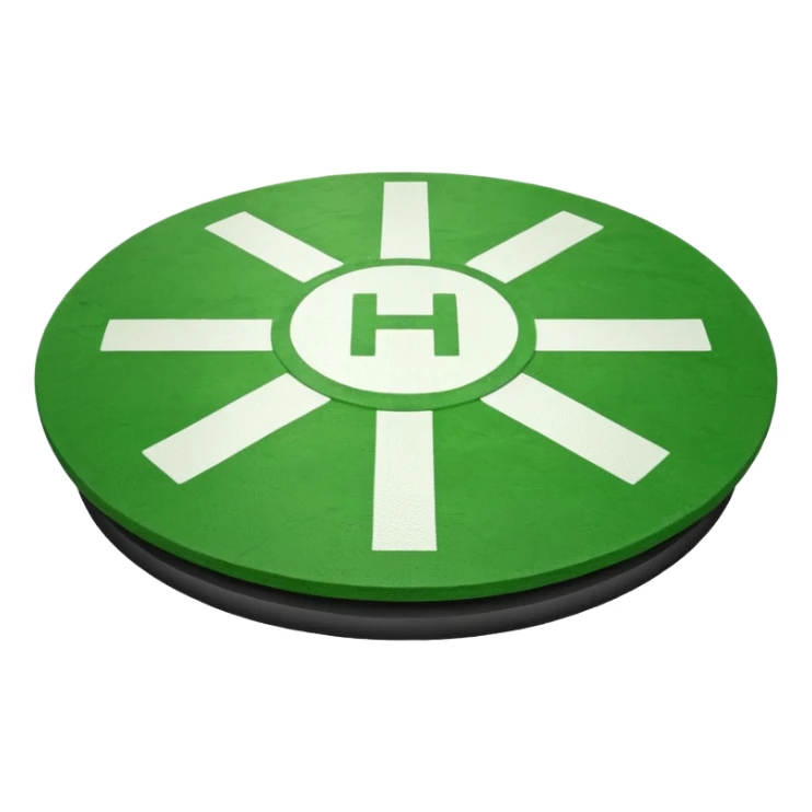 a helipad with a green surface and an H in the center sticker