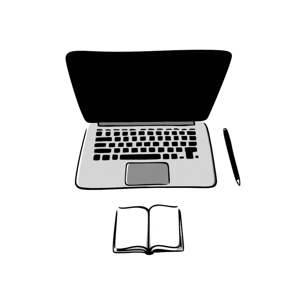 top view of a MacBook and a notebook with a pen nearby sticker