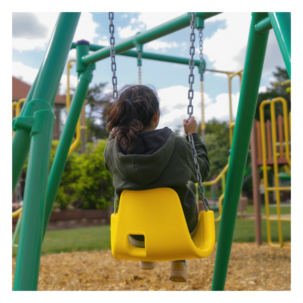 realistic playground swing-set, green frame, one yellow seat, outdoor setting sticker