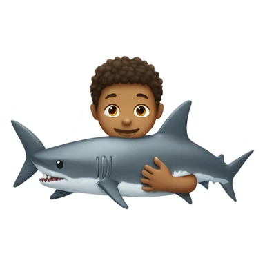 Tan little boy cuddling a shark sticker