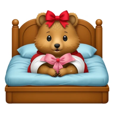 Quokka in a bed with a bow sticker