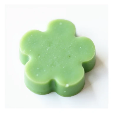 realistic green flower-shaped candy, isolated on a transparent background, no visible background sticker
