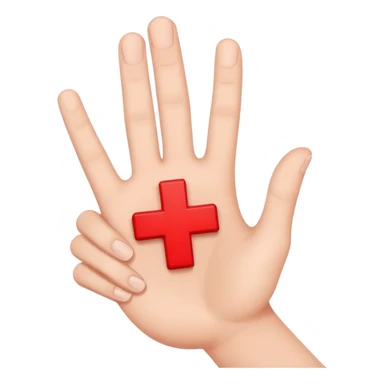 hand holding up a red cross sticker