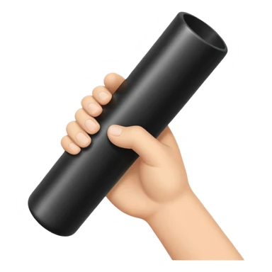 a hand holding a black tube sticker