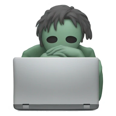 laptop with sad person sticker