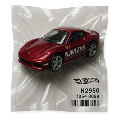 burgundy Hot Wheels Ferrari toy car with 'PLAVLEYS' lettering on the body, shiny and inflated, vacuum-sealed style sticker