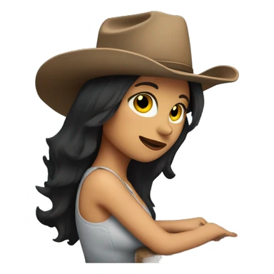 woman with dark hair infront of computer with a cowboy hat on head and sparkles behind sticker
