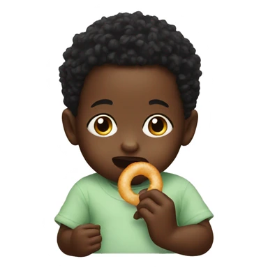 A black baby eating a onion ring sticker