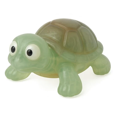 Make the turtle a natural color (e.g., green with a brown shell), more transparent and see-through, retro 90's toy style, derpy eyes, no tag, no background, soft plastic, soft reflections, soft and squishy, some cloudiness, not shiny, highly detailed, appealing. sticker