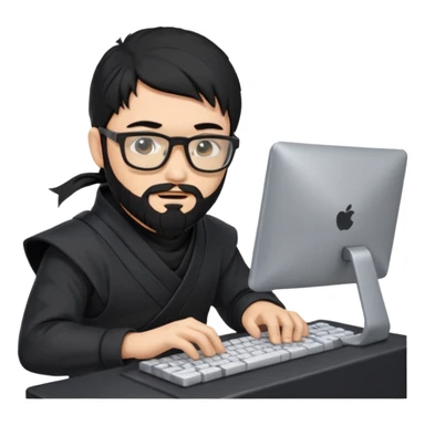 Man with black hair and beard wearing glasses in a ninja costume typing on a computer keyboard sticker