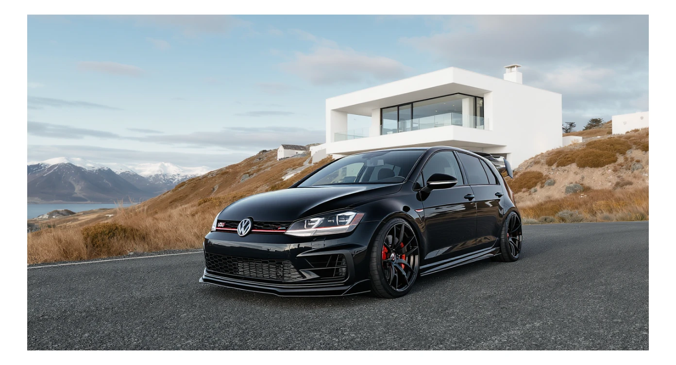 black Golf A4 with bodykit, in background is modern huge two flors white villa, in distance are iceland mountains, rule of thirds, shot on gopro hero, noise camera sticker
