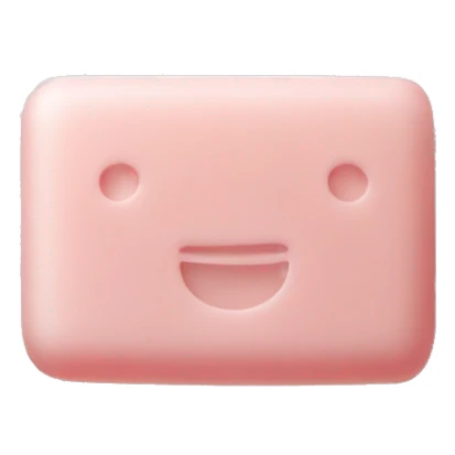 Light pink soap bar sitting on a soap holder sticker