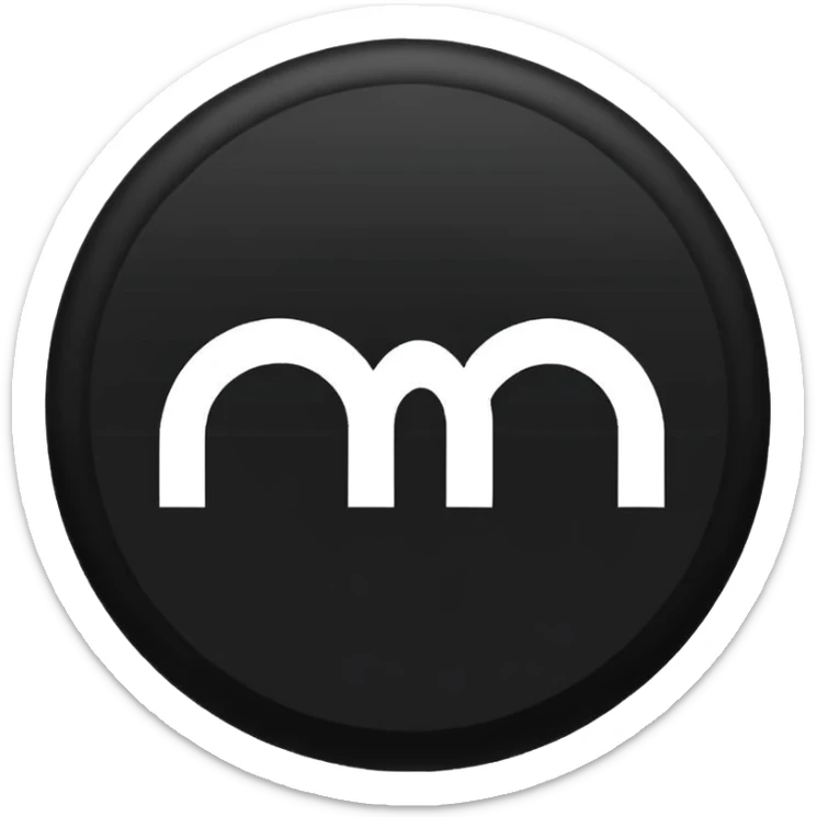 Black circle with “MB” written on in the middle of it. Nothing else no holes or anything. sticker