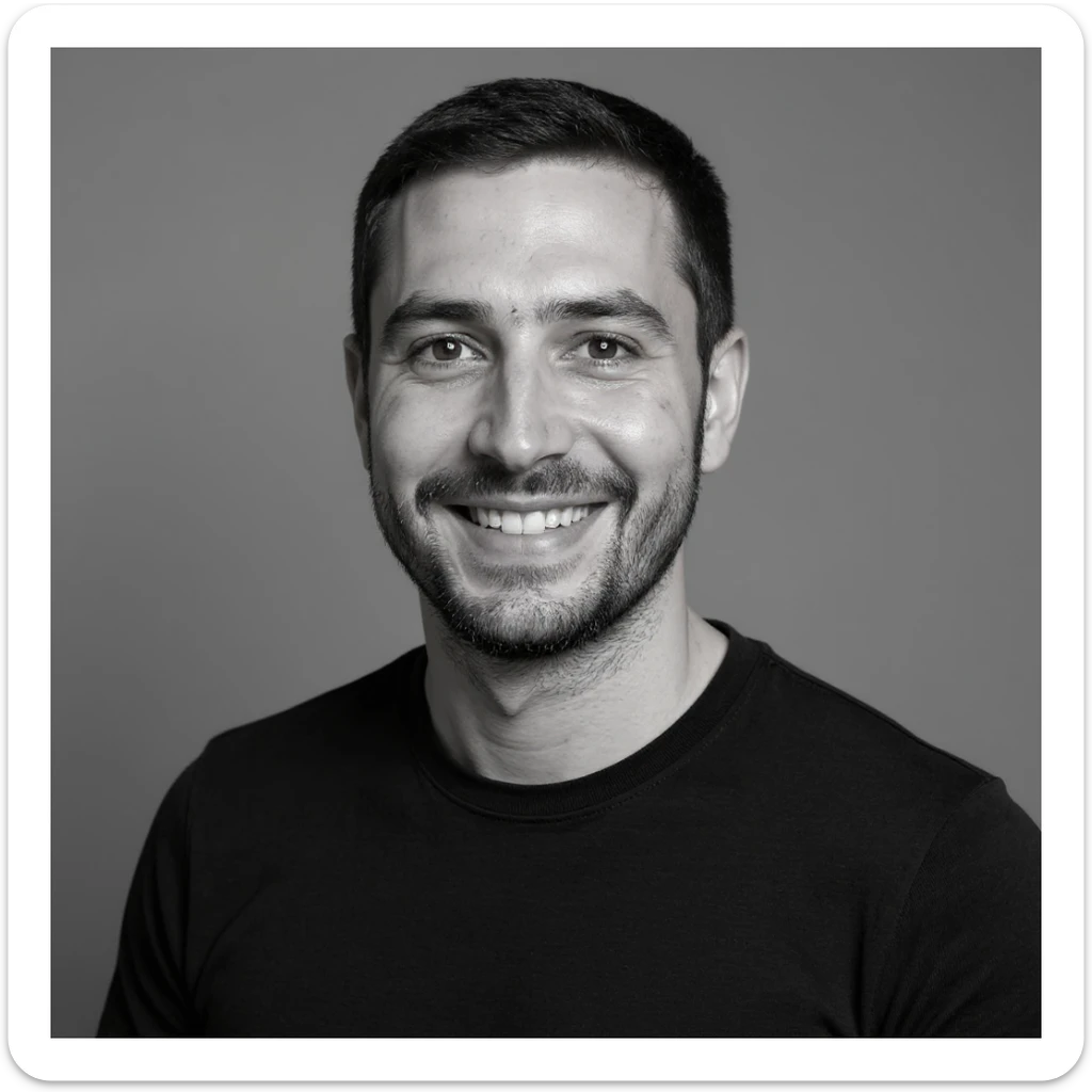 A professional portrait in monochrome. Plain black crew neck shirt. Tailored to LinkedIn. Tech boy vibe (programmer) sticker