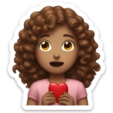 Girl with brown curly hair crying and holding a red heart sticker