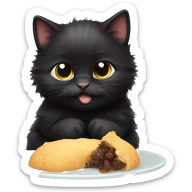 fluffy fat black kitten eating sticker